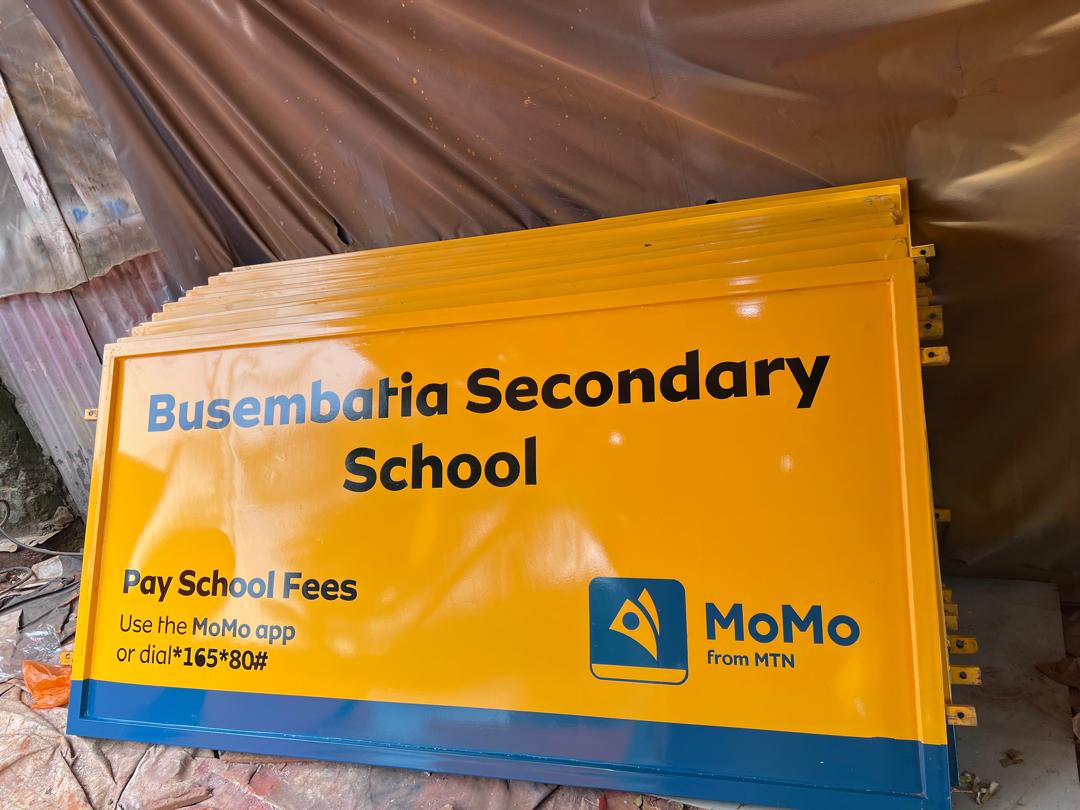 Busembatia Secondary School Sign with MoMo Payment Info